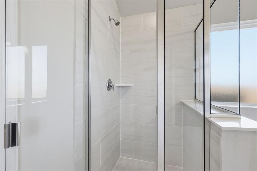 Bathroom featuring a stall shower Bathroom featuring a stall shower