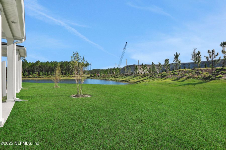 Exterior details and patio area of a home in Brook Forest - Townhomes, St. Augustine (Image 4).