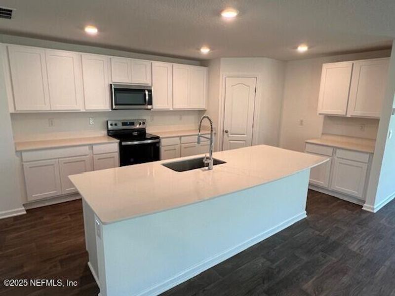 Furnished interior view inside a new home in Sawmill Branch Express, Palm Coast (Image 9). Furnished interior view inside a new home in Sawmill Branch Express, Palm Coast (Image 9).