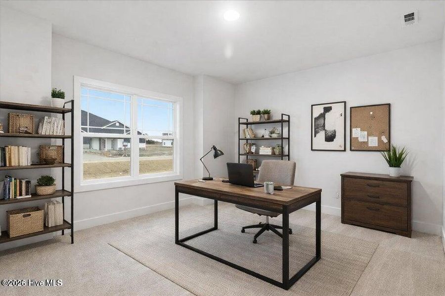 Furnished interior view inside a new home in Wood Creek Landing, Leland (Image 14).