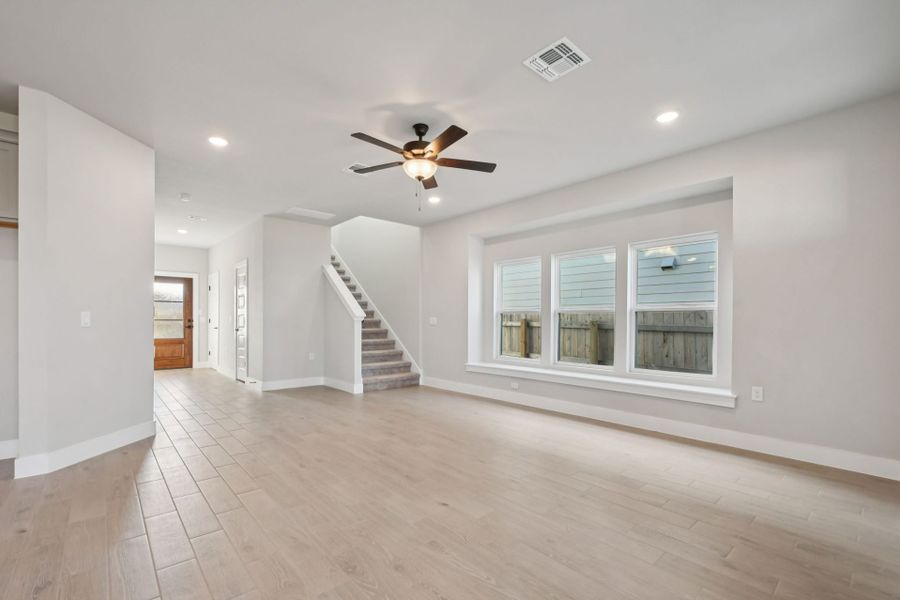 Spacious, unfurnished interior of a new home in Whisper Valley, Manor (Image 11).