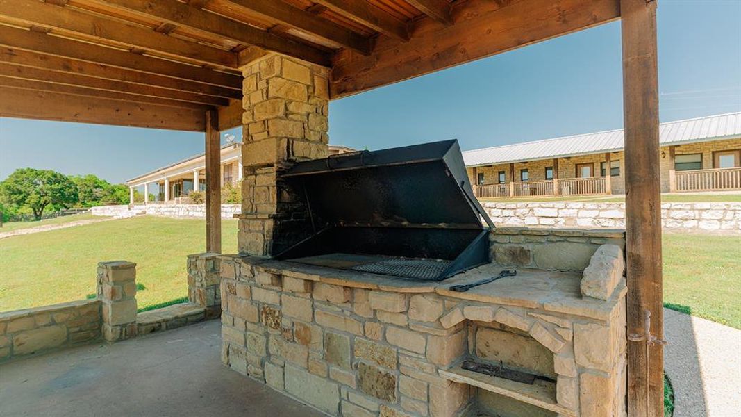 View of storm shelter with a lawn