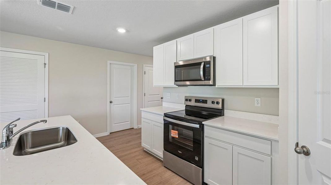 Furnished interior view inside a new home in Oakfield Lakes, Palmetto (Image 6).