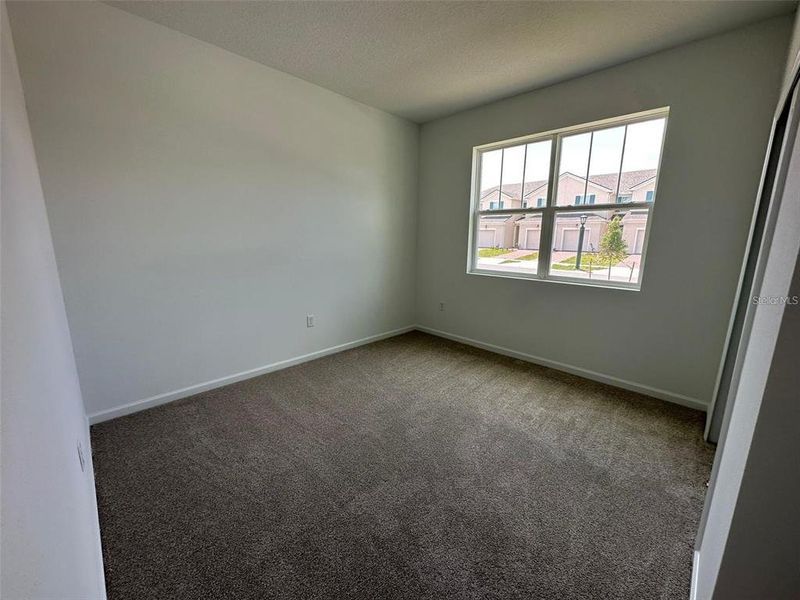Spacious, unfurnished interior of a new home in Soleil, Kissimmee (Image 11).