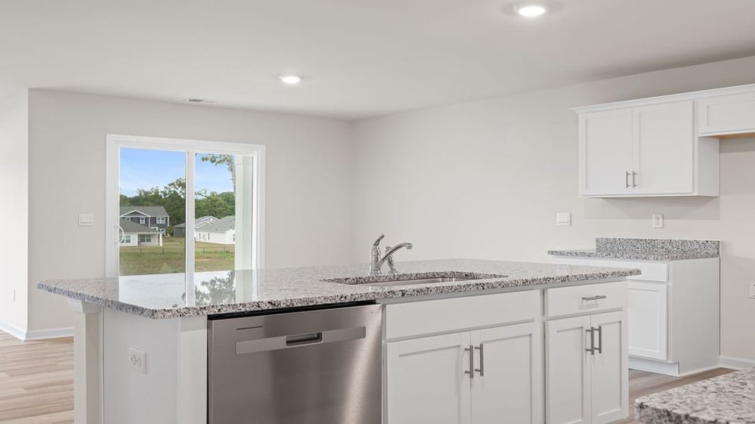 Furnished interior view inside a new home in Lakestone, Woodruff (Image 6).