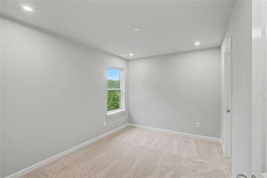 Spacious, unfurnished interior of a new home in The Reserve at Chapel Hill Phase II, Douglasville (Image 32).