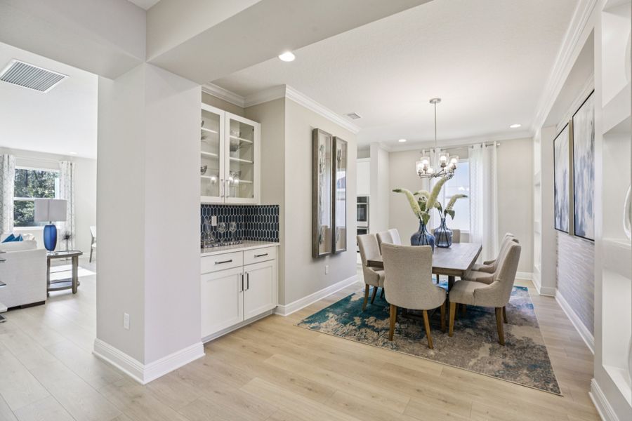 Representative furnished interior of a home built from the Palmer Executive by Risewell Homes in Bargrove Estates, Mount Dora (Image 9).