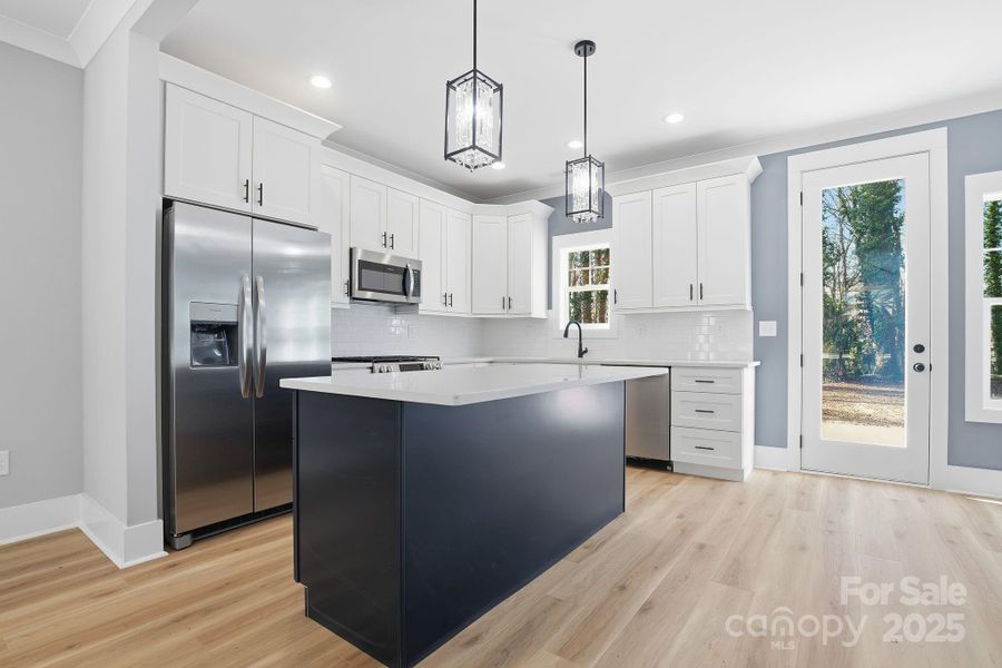 Furnished interior view inside a new home in , Belmont (Image 8).