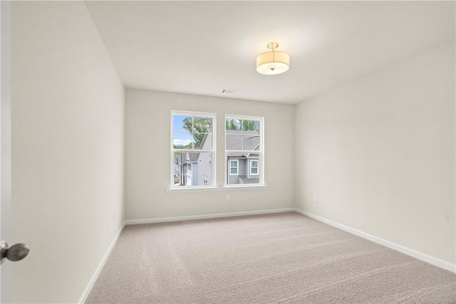 Spacious, unfurnished interior of a new home in The Village at Shallowford, Kennesaw (Image 27).