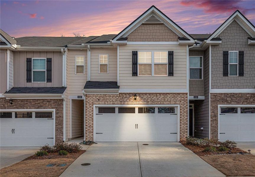 Front exterior of a new home in , Lawrenceville, GA, highlighting curb appeal (Image 18). Front exterior of a new home in , Lawrenceville, GA, highlighting curb appeal (Image 18).