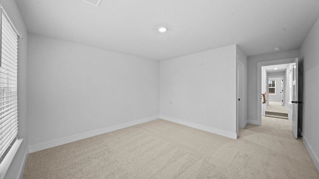 Refined bedroom design with large windows for daylight-filled mornings and peaceful views Refined bedroom design with large windows for daylight-filled mornings and peaceful views