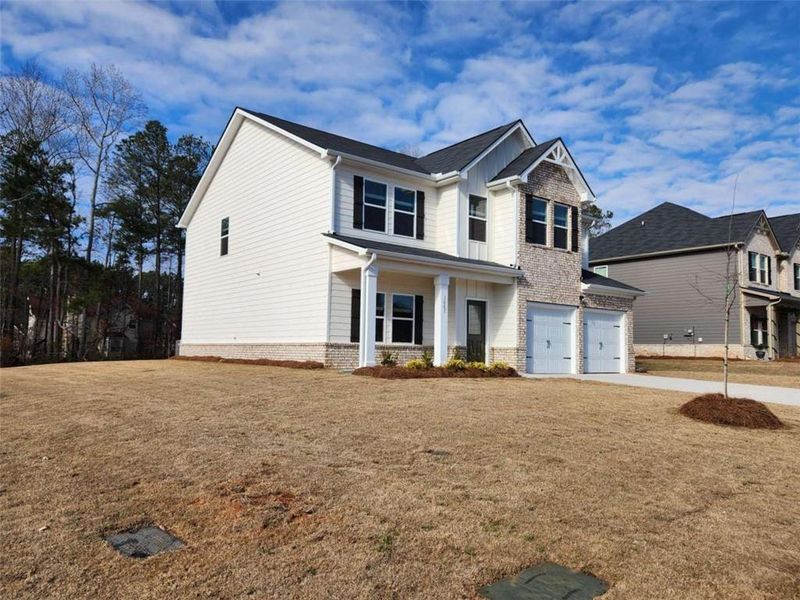 Exterior details and patio area of a home in Southern Hills, McDonough (Image 27).