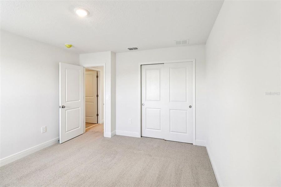 Spacious, unfurnished interior of a new home in The Reserve at Hammock Oaks - Classic Series, Lady Lake (Image 29).