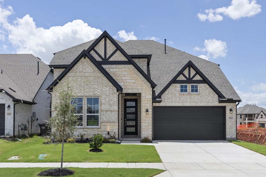 Front exterior of a new home in Sutton Fields, Celina, TX, highlighting curb appeal (Image 1). Front exterior of a new home in Sutton Fields, Celina, TX, highlighting curb appeal (Image 1).