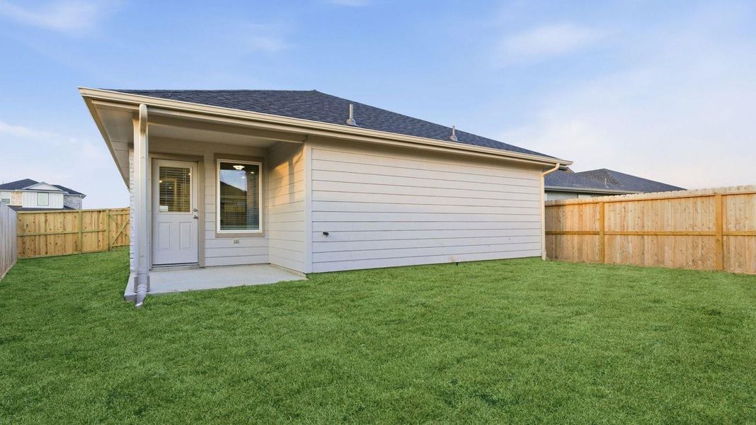 A Spacious laundry room with washer and dryer connections, hanging rod, and vinyl wood flooring