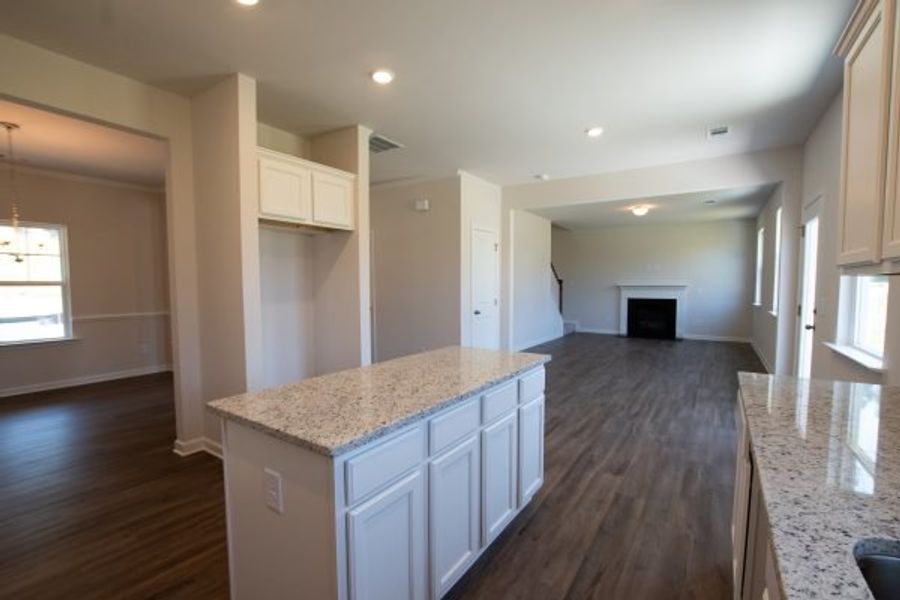 Representative furnished interior of a home built from the Fairfax by Piedmont Residential in Falls Creek, Flowery Branch (Image 6).