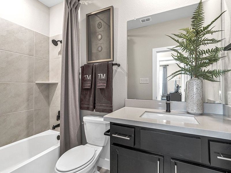 Furnished interior view inside a new home in Avalon at Cypress, Cypress (Image 40).