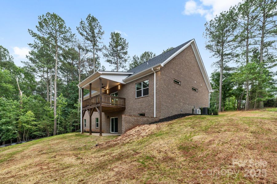 Front exterior of a new home in , Granite Falls, NC, highlighting curb appeal (Image 1).