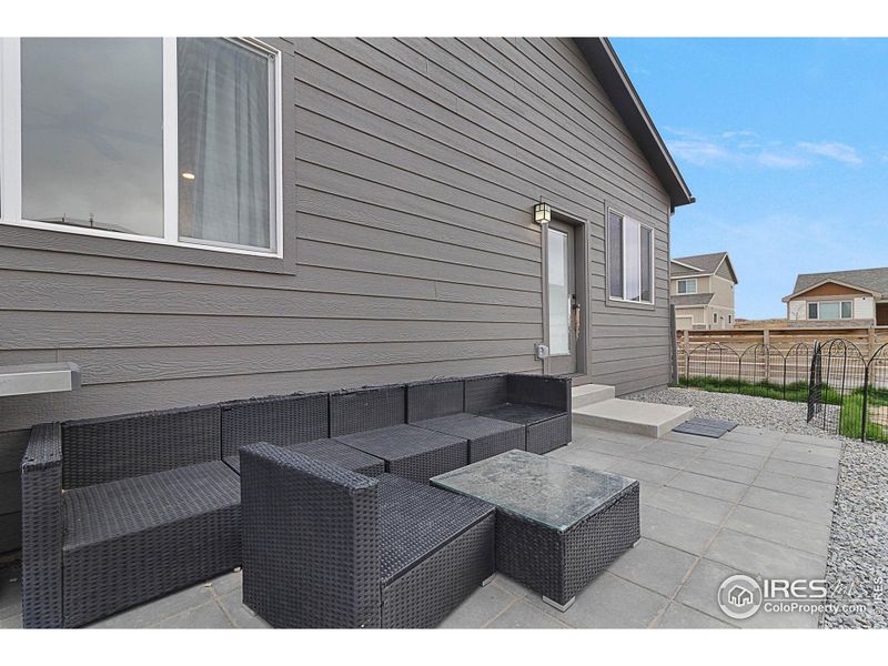 Front exterior of a new home in , Greeley, CO, highlighting curb appeal (Image 1).