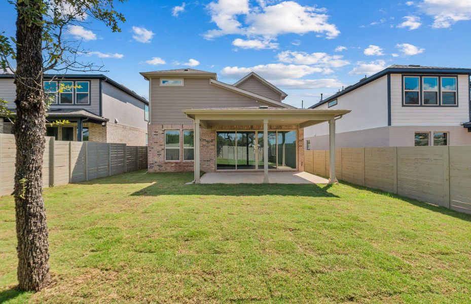 Exterior details and patio area of a home in Wolf Ranch, Georgetown (Image 15).