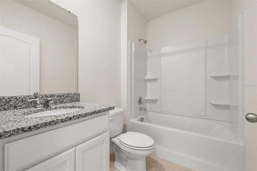 Furnished interior view inside a new home in , Kissimmee (Image 8). Furnished interior view inside a new home in , Kissimmee (Image 8).
