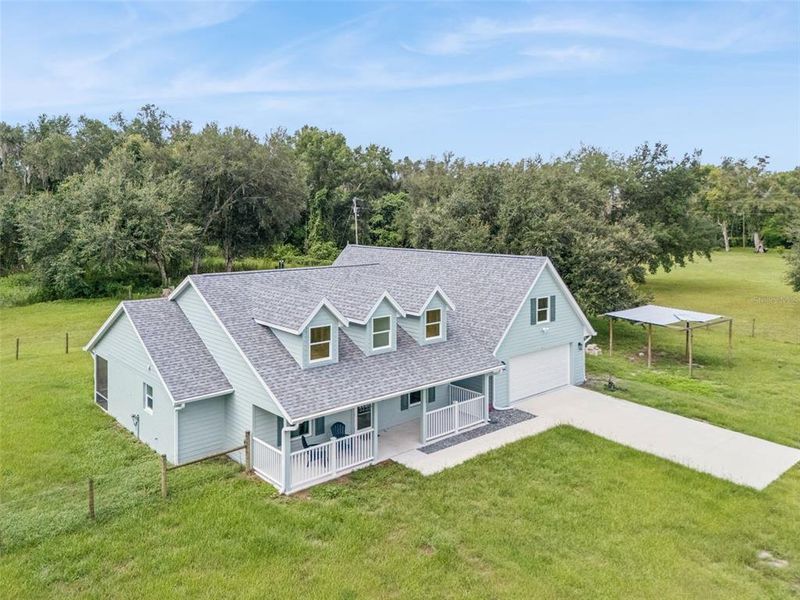 Front exterior of a new home in , Webster, FL, highlighting curb appeal (Image 20).
