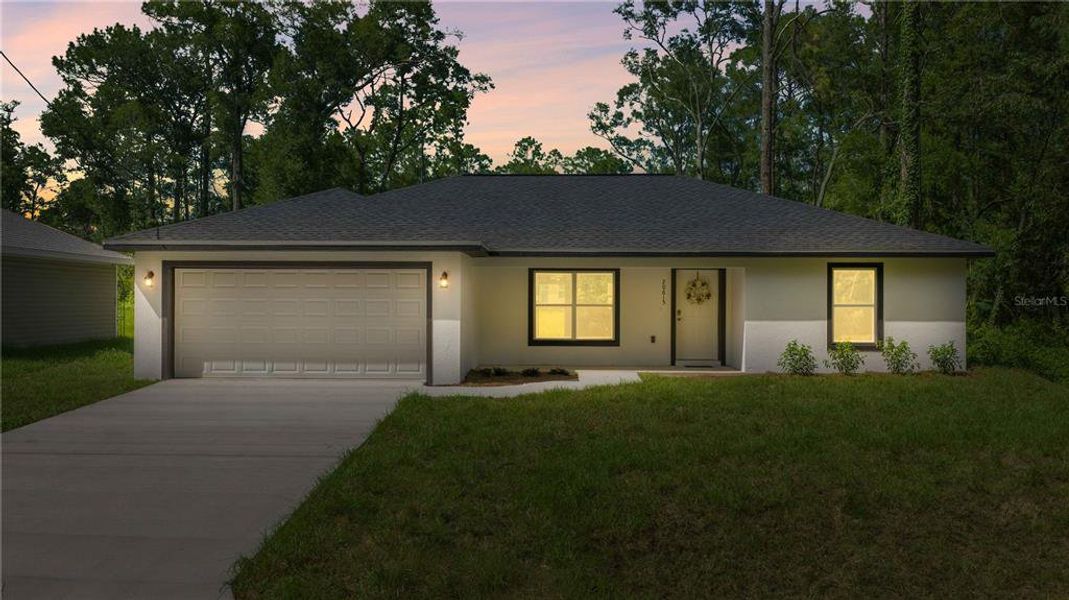 Front exterior of a new home in , Dunnellon, FL, highlighting curb appeal (Image 21).