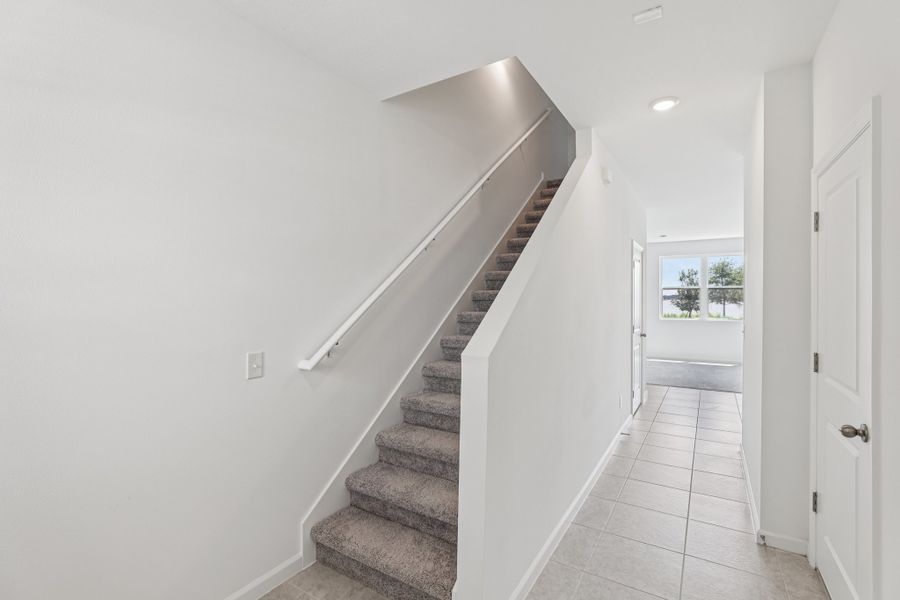 Representative unfurnished interior of a home built from the Pulsar by Starlight Homes in Aster Towns, Summerville (Image 18).
