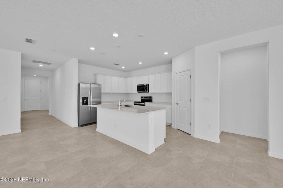 Furnished interior view inside a new home in Hyland Trail, Green Cove Springs (Image 9).