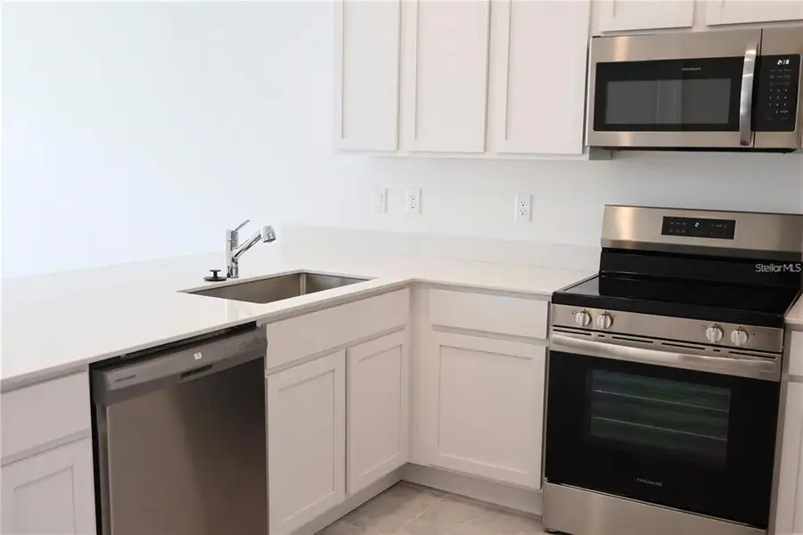 Furnished interior view inside a new home in , Kissimmee (Image 3).