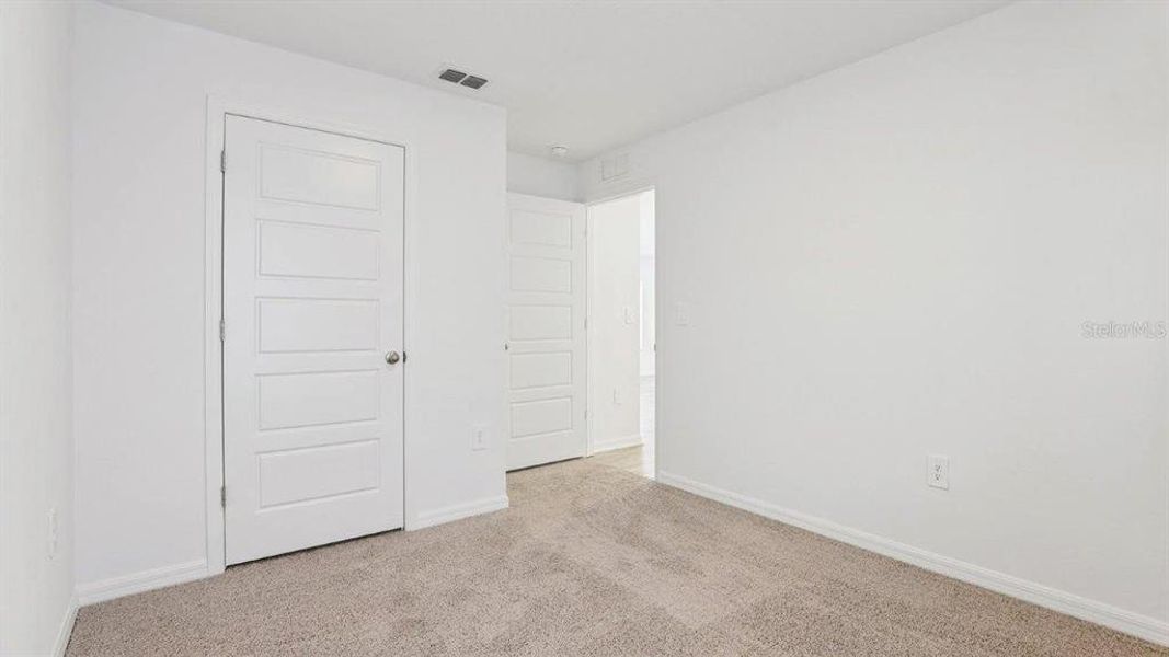 Spacious, unfurnished interior of a new home in Villamar, Winter Haven (Image 22).