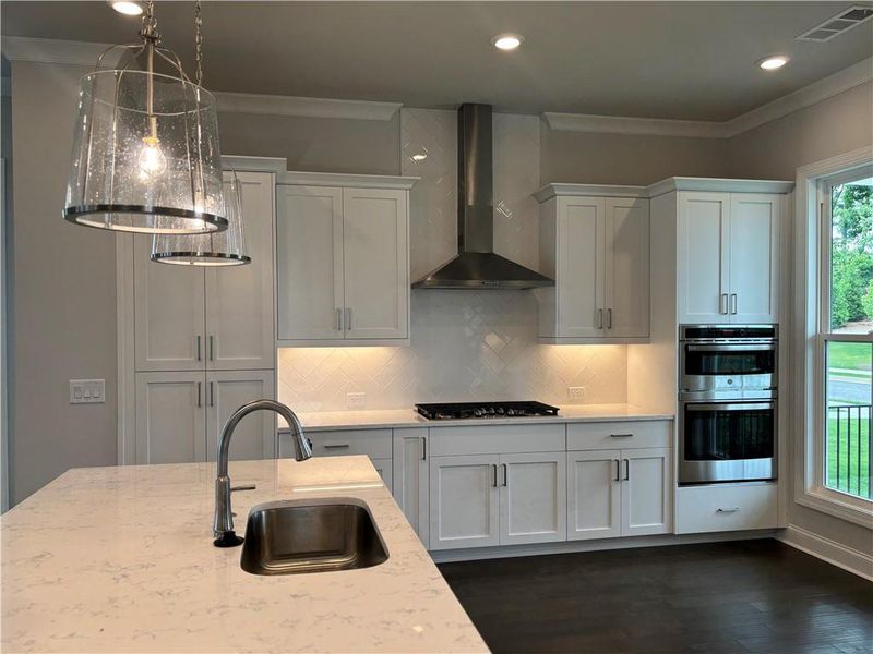 Furnished interior view inside a new home in Brackley Single Family, Cumming (Image 11).