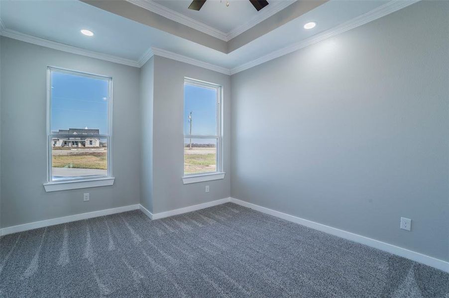 Carpeted spare room featuring recessed lighting, crown molding, and a ceiling fan Carpeted spare room featuring recessed lighting, crown molding, and a ceiling fan