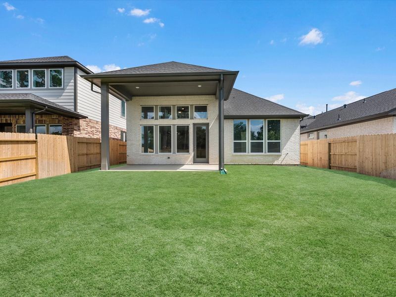 Exterior details and patio area of a home in Oakhill Reserve, Tomball (Image 3).