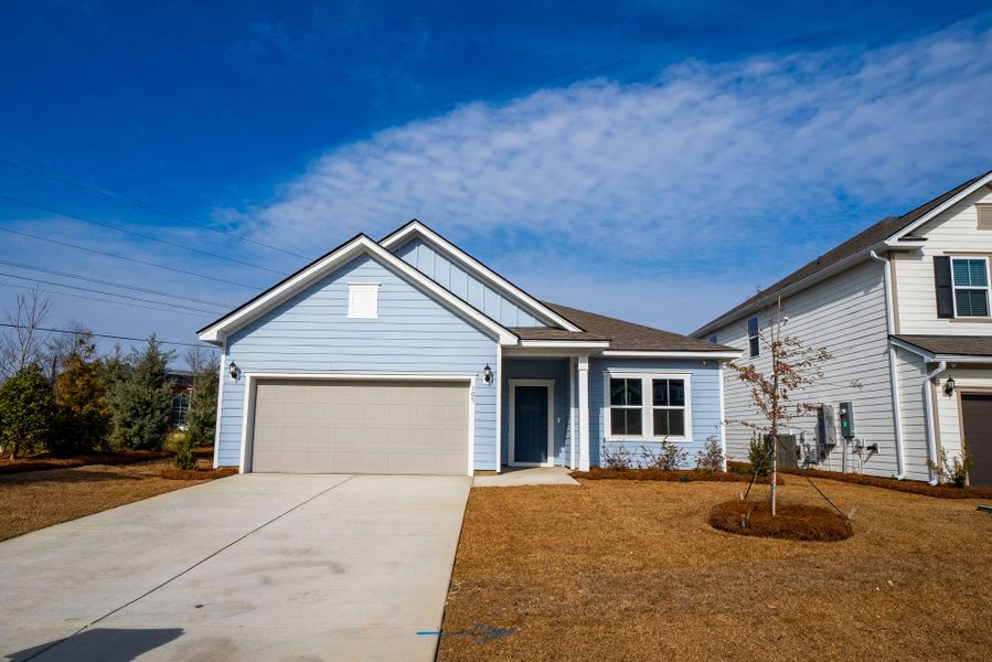 Front exterior of a new home in Monroe Preserve, Chapin, SC, highlighting curb appeal (Image 26).