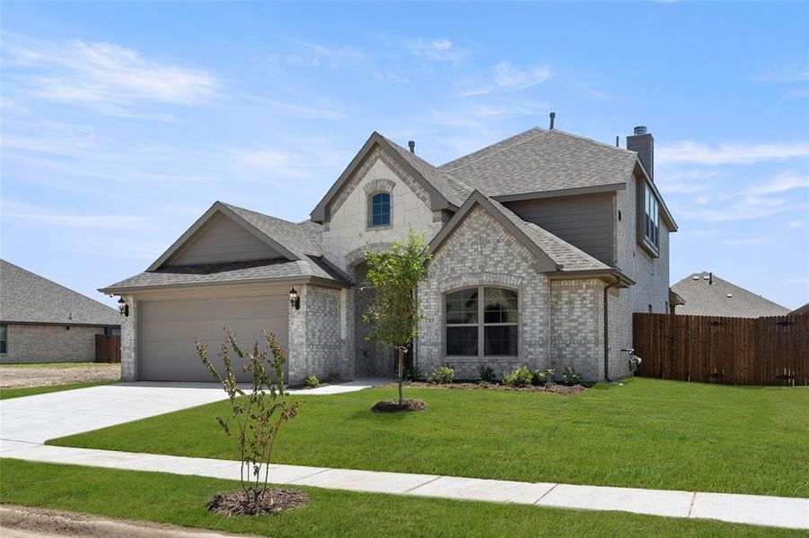 Front exterior of a new home in The Parks at Panchasarp Farms - Phase 2, Burleson, TX, highlighting curb appeal (Image 23). Front exterior of a new home in The Parks at Panchasarp Farms - Phase 2, Burleson, TX, highlighting curb appeal (Image 23).