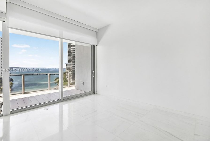 Spacious, unfurnished interior of a new home in Aston Martin Residences, Miami (Image 7).