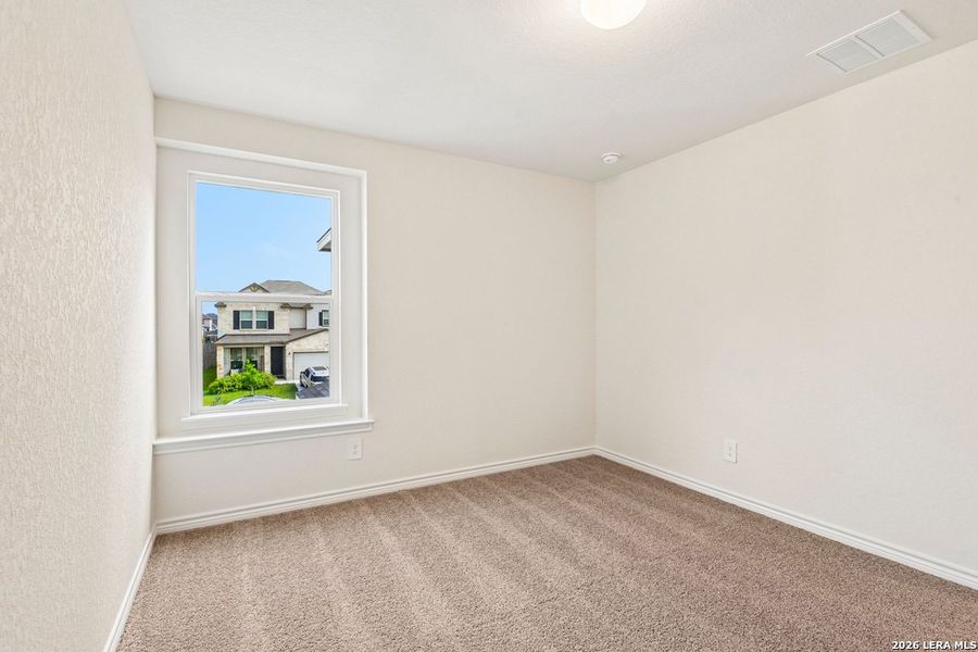 Spacious, unfurnished interior of a new home in Woodside Farms, Seguin (Image 35).