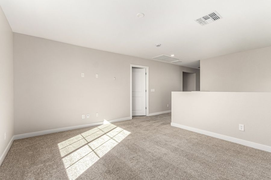 Spacious, unfurnished interior of a new home in Bentridge – Canyon Series, Buckeye (Image 8). Spacious, unfurnished interior of a new home in Bentridge – Canyon Series, Buckeye (Image 8).