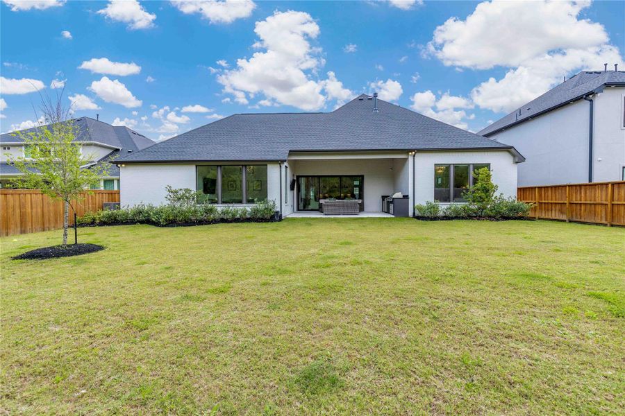 Exterior details and patio area of a home in , Spring (Image 26).