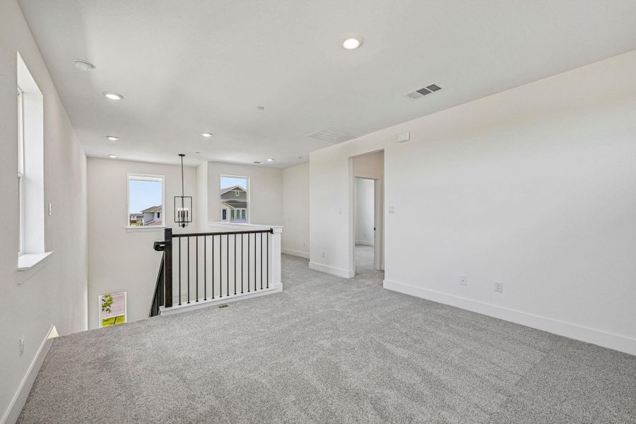 Spacious, unfurnished interior of a new home in Avery Centre, Round Rock (Image 22).