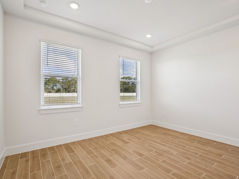 Spacious, unfurnished interior of a new home in Magnolia Bay - Reserve Series, Nokomis (Image 10).