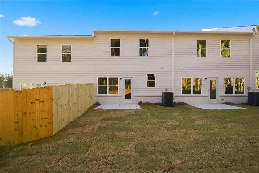 Exterior details and patio area of a home in Shoals Crossing, Conyers (Image 3). Exterior details and patio area of a home in Shoals Crossing, Conyers (Image 3).