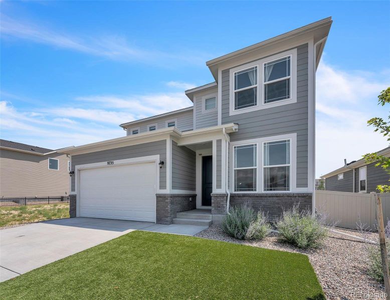 Front exterior of a new home in , Fountain, CO, highlighting curb appeal (Image 33).