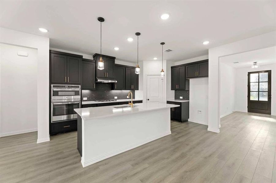 Furnished interior view inside a new home in Coyote Meadows, Anna (Image 13).