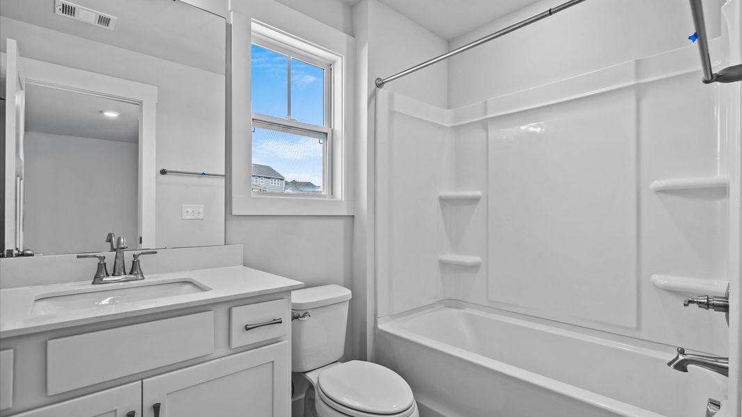 Furnished interior view inside a new home in Pinebrook, Woodruff (Image 22).