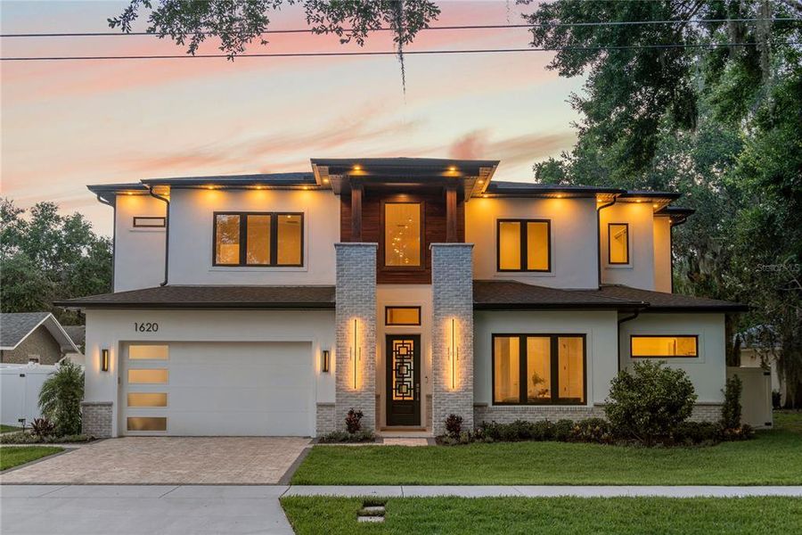 Front exterior of a new home in , Orlando, FL, highlighting curb appeal (Image 40). Front exterior of a new home in , Orlando, FL, highlighting curb appeal (Image 40).