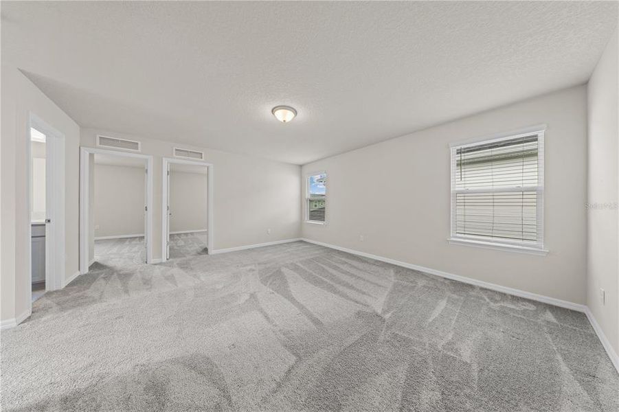 Spacious, unfurnished interior of a new home in EverBe, Orlando (Image 27).