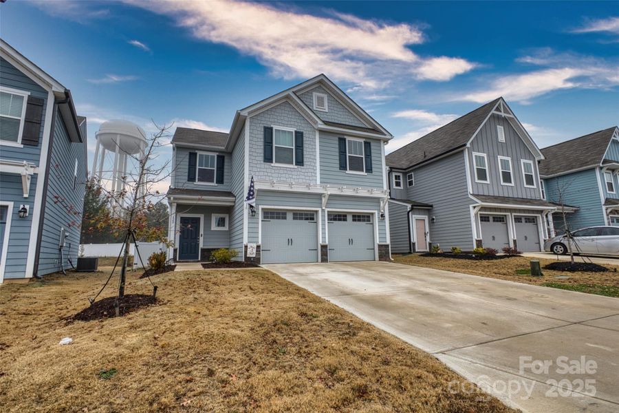 Front exterior of a new home in , York, SC, highlighting curb appeal (Image 1). Front exterior of a new home in , York, SC, highlighting curb appeal (Image 1).