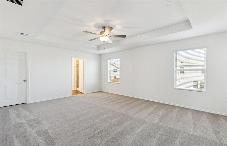 Spacious owner's suite with private bath